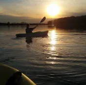 Kayaking into the sunset