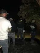 Crew setting up for a night bowfishing outing