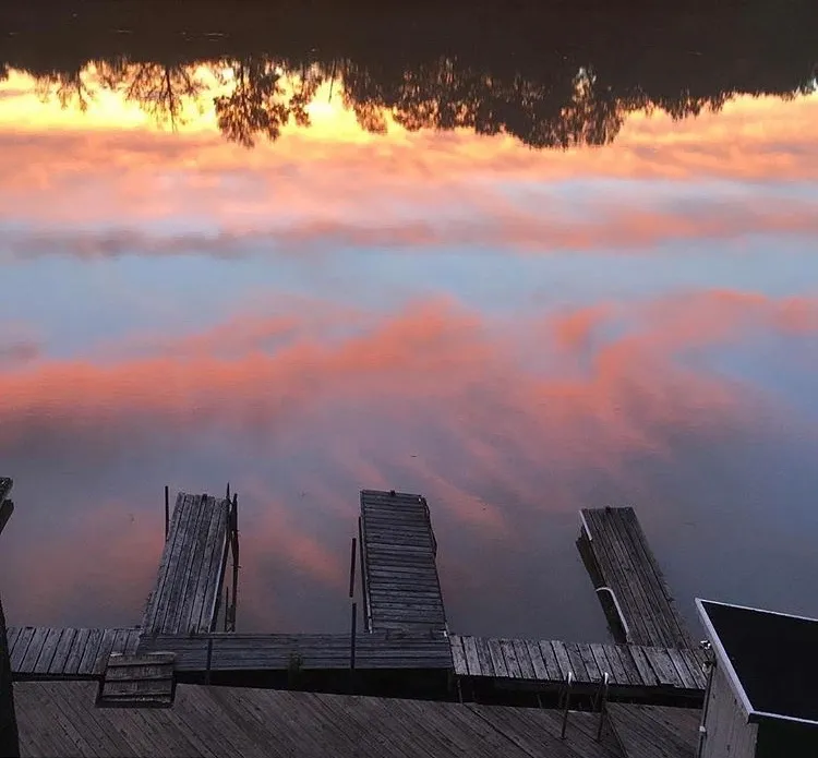 Sunset reflecting on the lake at the dock